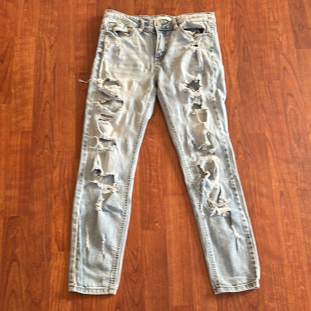 Eunina Distressed Light Blue Jeans size 9. Mid rise skinny.